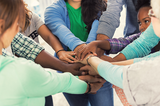 Community hands in teamwork